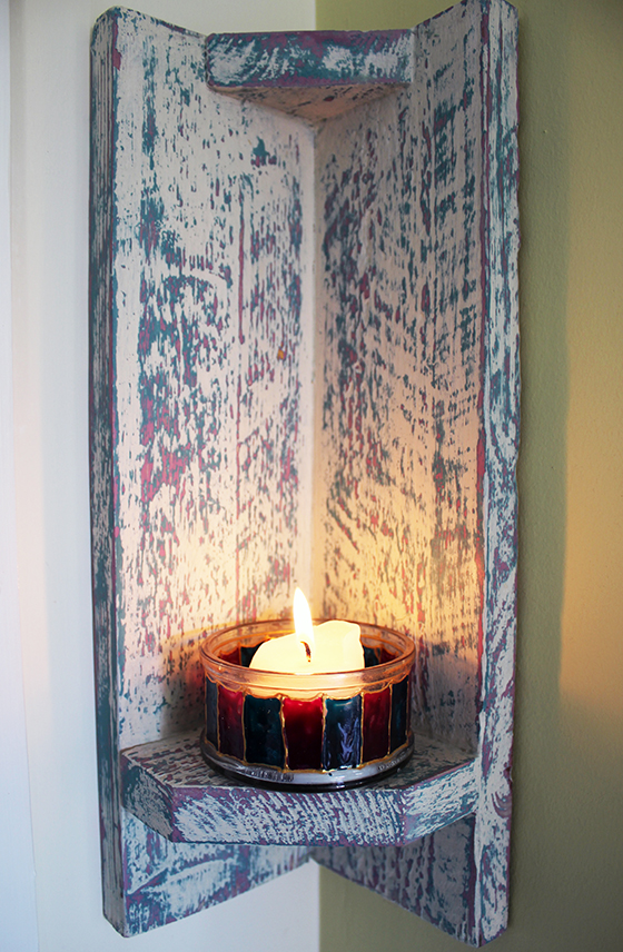 Corner candle sconce
